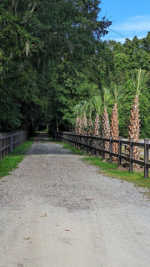 view of gate featuring fence