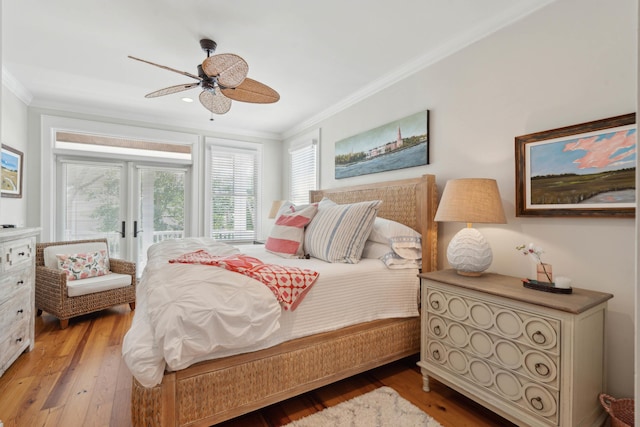 bedroom with access to outside, ornamental molding, light wood-style flooring, and ceiling fan