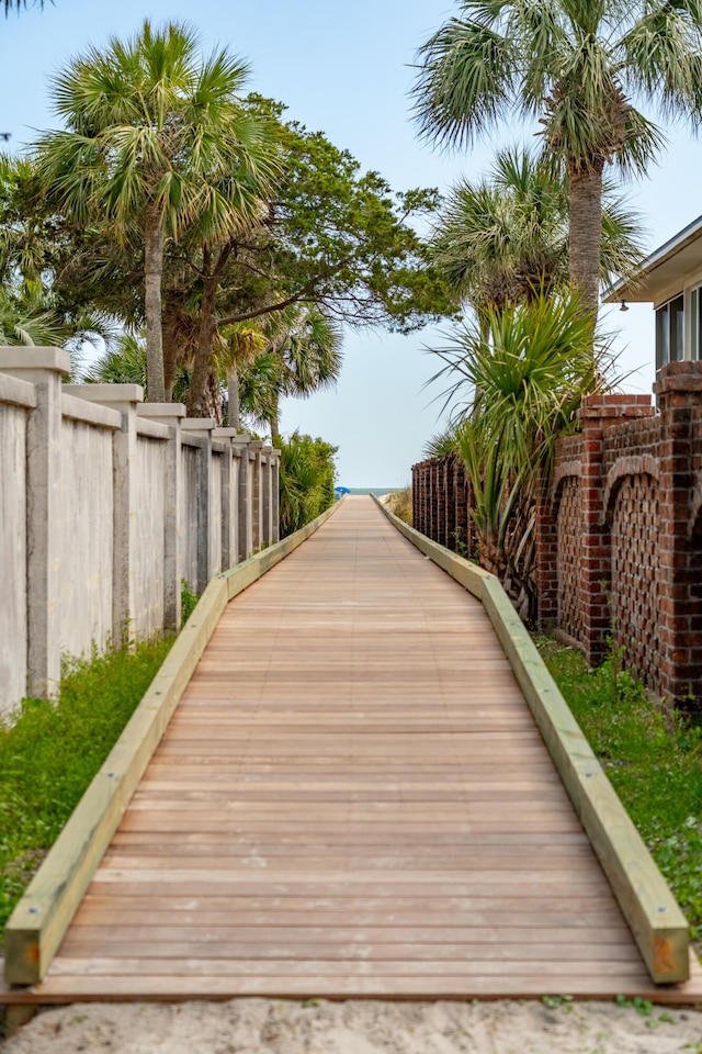 view of property's community with fence