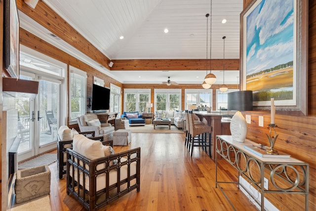 living area featuring recessed lighting, a wealth of natural light, and light wood-style floors