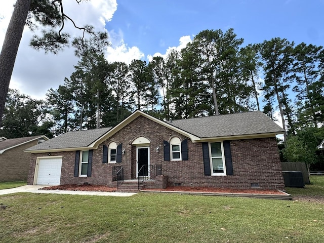 ranch-style house with a garage and a front lawn