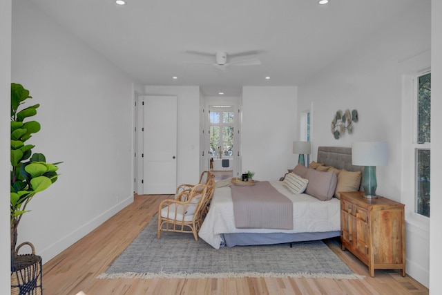 bedroom featuring ceiling fan and wood-type flooring