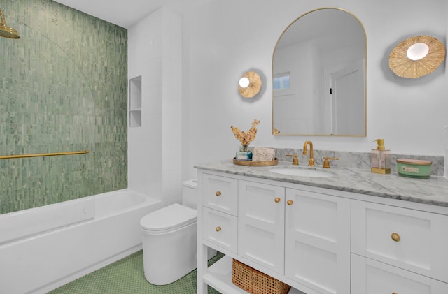 full bathroom featuring washtub / shower combination, tile patterned floors, vanity, and toilet