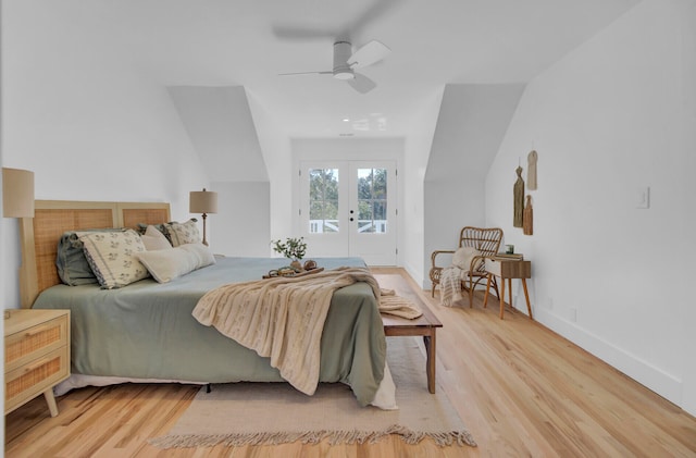 bedroom with access to exterior, ceiling fan, light hardwood / wood-style flooring, and french doors