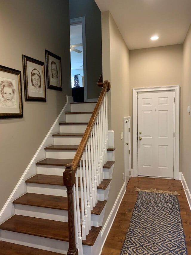 interior space featuring baseboards, recessed lighting, and wood finished floors