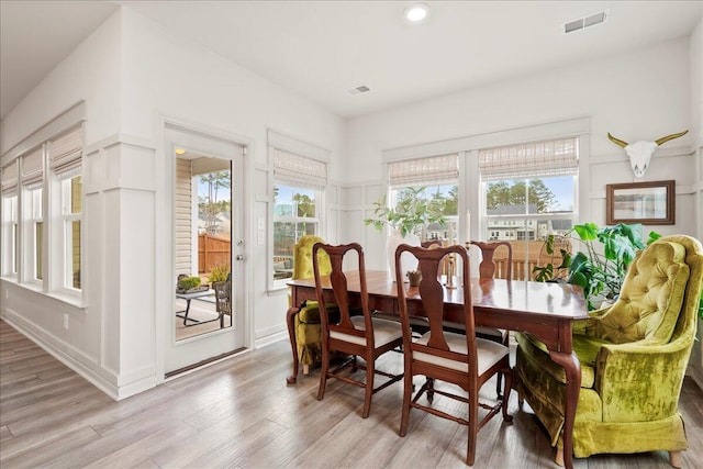 dining room with light wood-type flooring