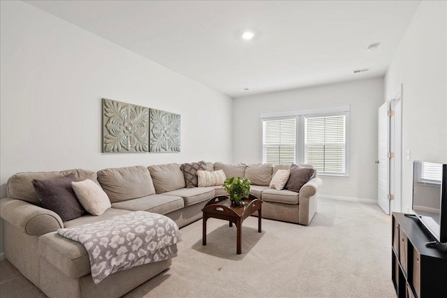 living room with light colored carpet