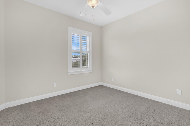 empty room with baseboards and ceiling fan