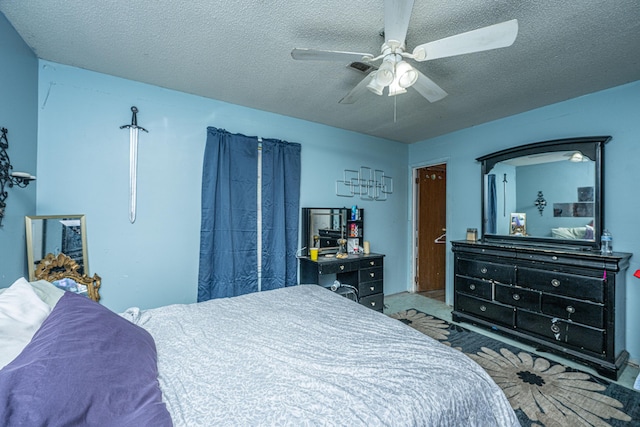 1004 Miles Jamison Rd, Summerville, SC 29485 - carpeted bedroom with a textured ceiling and ceiling fan
