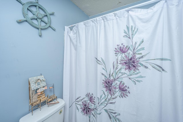 1004 Miles Jamison Rd, Summerville, SC 29485 - full bathroom featuring toilet, a textured ceiling, and a shower with shower curtain