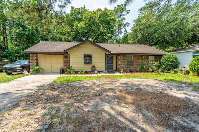 1004 Miles Jamison Rd, Summerville, SC 29485 - ranch-style house featuring brick siding, driveway, an attached garage, and a shingled roof