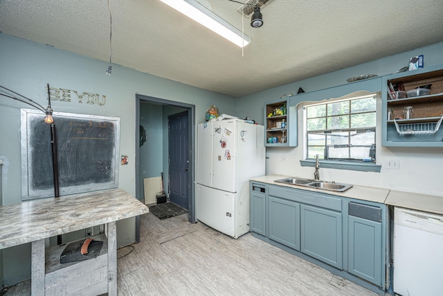 1004 Miles Jamison Rd, Summerville, SC 29485 - kitchen featuring white appliances, open shelves, a sink, a textured ceiling, and light countertops