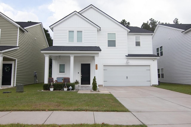 217 Pink Azalea St, Summerville, SC 29485 - view of front of home with board and batten siding, an attached garage, and roof with shingles