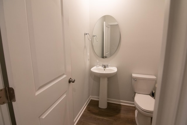 217 Pink Azalea St, Summerville, SC 29485 - half bathroom with toilet, wood finished floors, and baseboards