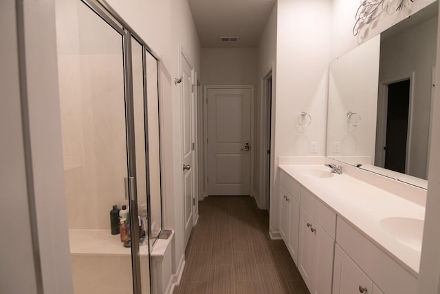 217 Pink Azalea St, Summerville, SC 29485 - bathroom featuring a sink, visible vents, double vanity, and a stall shower