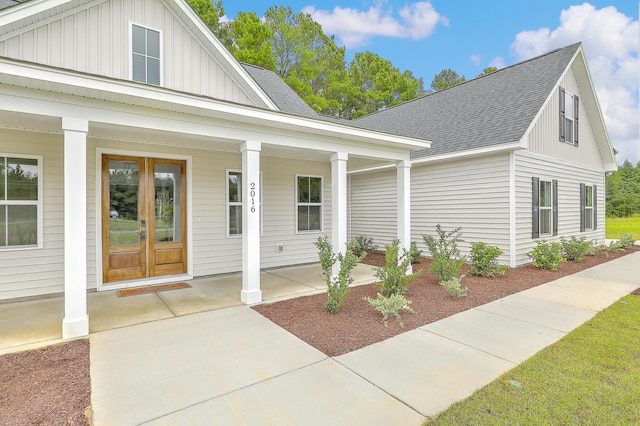 view of front of house featuring french doors and a porch