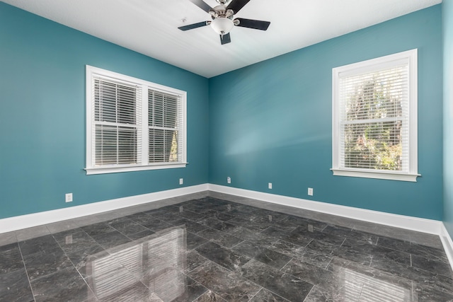 empty room with ceiling fan