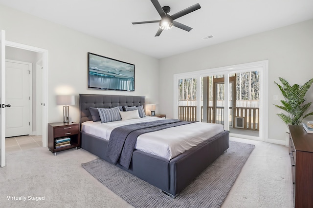 bedroom with visible vents, light carpet, ceiling fan, and access to outside