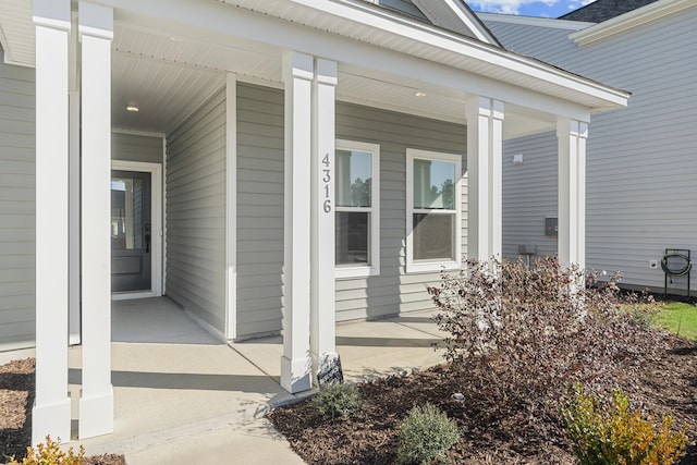 entrance to property with covered porch