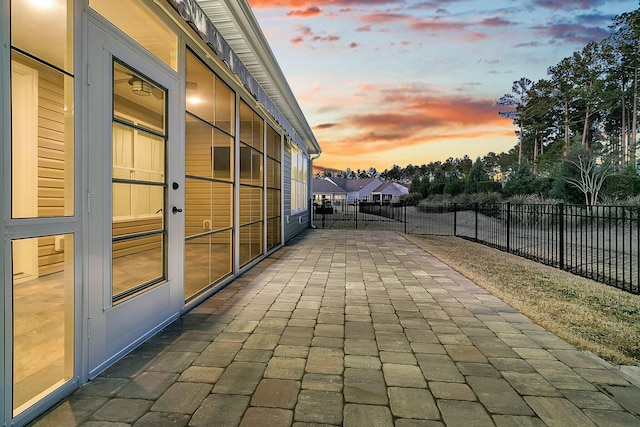 view of patio terrace at dusk