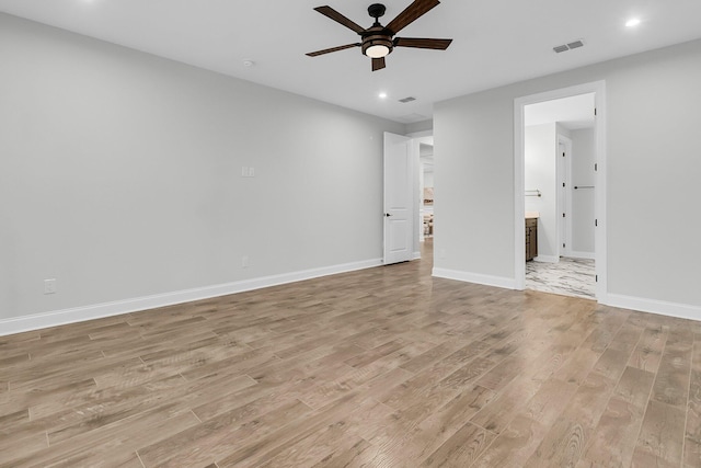 interior space with light hardwood / wood-style flooring and ceiling fan