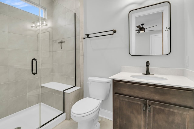 bathroom with walk in shower, vanity, and toilet