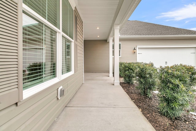 view of patio / terrace with a garage