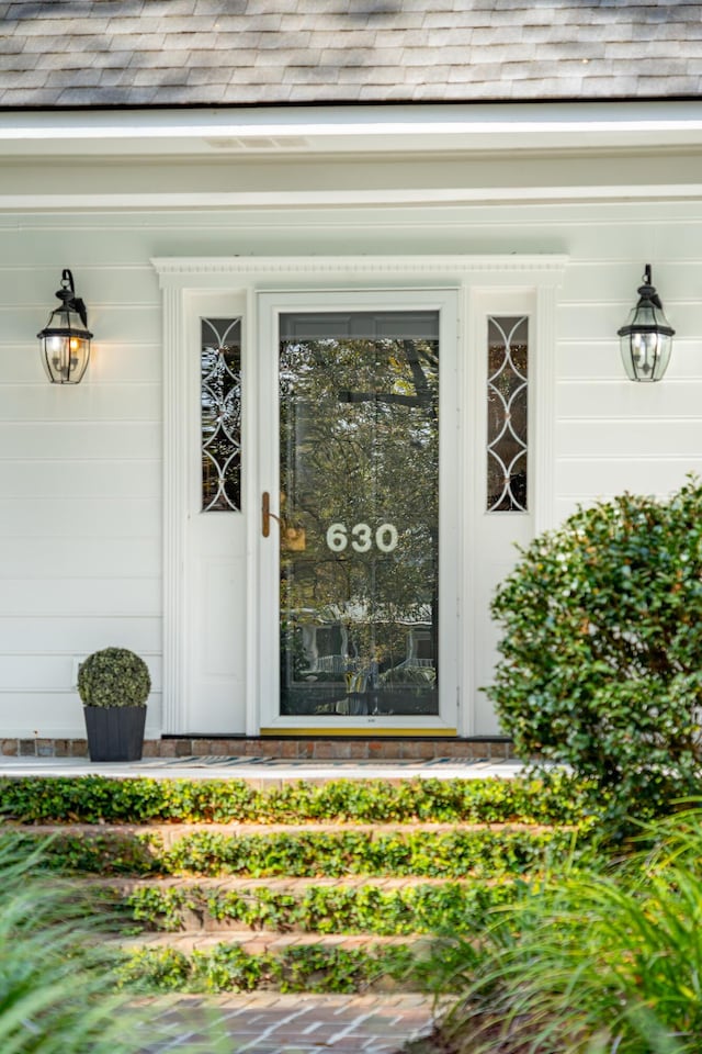 630 Cain Dr, Mount Pleasant, SC 29464 - entrance to property featuring roof with shingles
