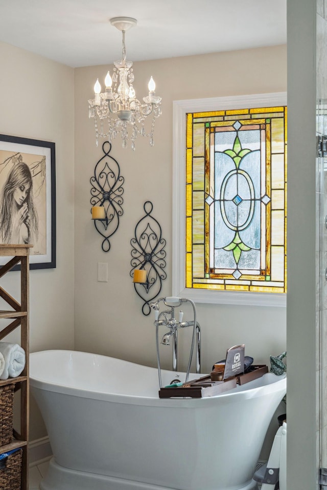 630 Cain Dr, Mount Pleasant, SC 29464 - bathroom featuring a chandelier and a freestanding bath