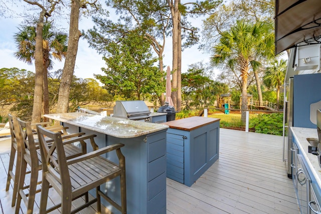 630 Cain Dr, Mount Pleasant, SC 29464 - wooden deck featuring a playground