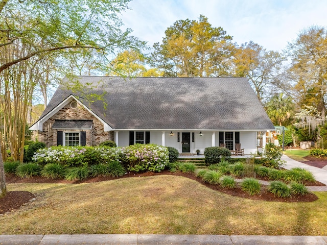 630 Cain Dr, Mount Pleasant, SC 29464 - view of front of property featuring a porch, roof with shingles, and a front lawn