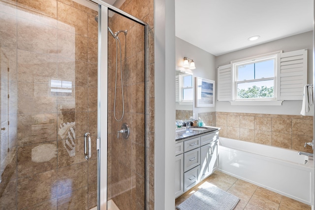 2087 Sterling Marsh Ln, Seabrook Island, SC 29455 - bathroom featuring a garden tub, vanity, a shower stall, and tile patterned flooring