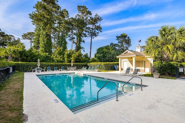 2087 Sterling Marsh Ln, Seabrook Island, SC 29455 - community pool featuring a patio area