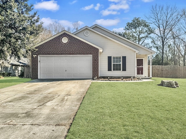 ranch-style home featuring a front lawn and a garage