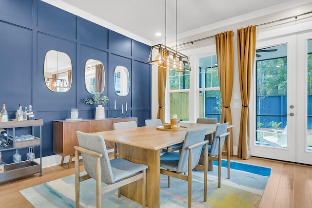 dining area with light hardwood / wood-style flooring