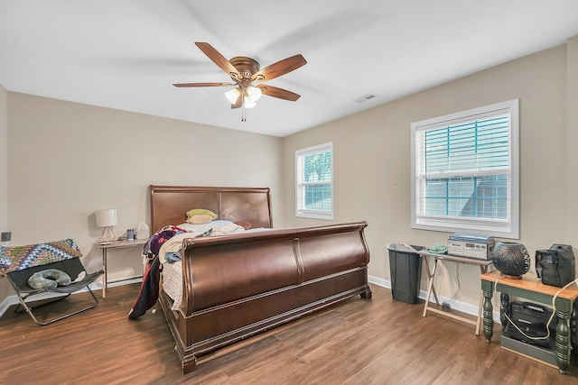 bedroom featuring ceiling fan and hardwood / wood-style floors