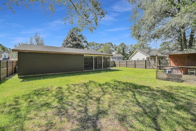 view of yard featuring a wooden deck