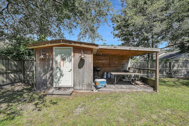 view of outdoor structure with a yard