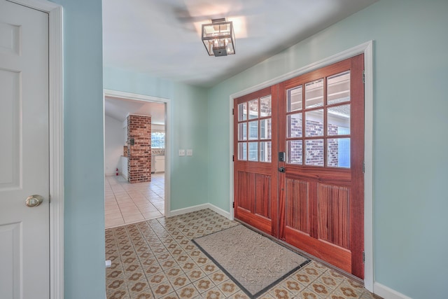 foyer with light tile patterned floors