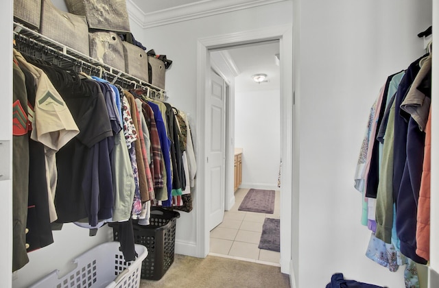 spacious closet with light tile patterned flooring