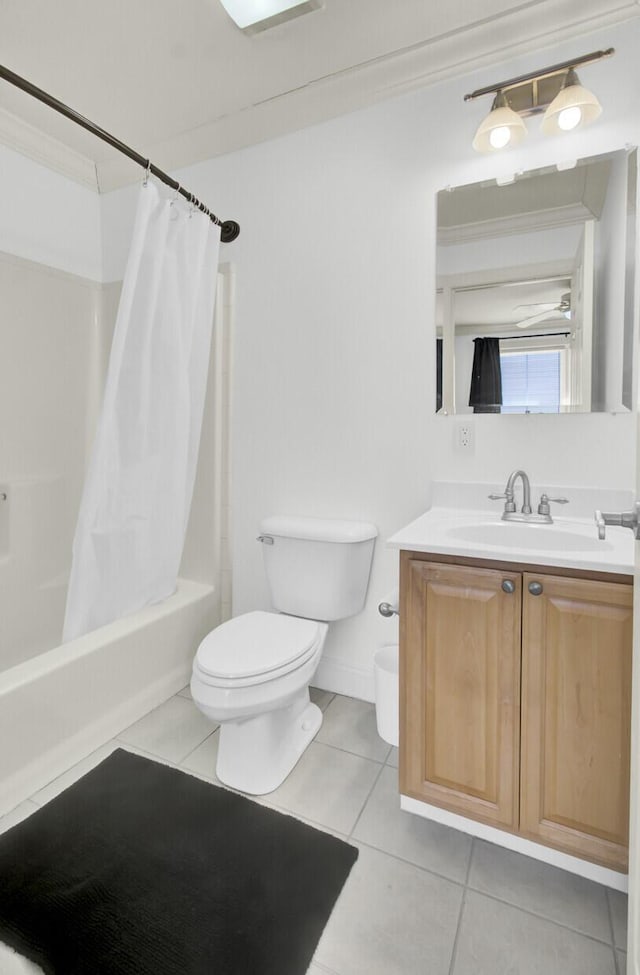 full bathroom with vanity, tile patterned floors, toilet, and shower / bath combo