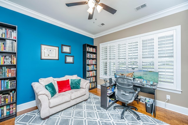 office featuring crown molding, hardwood / wood-style floors, and ceiling fan