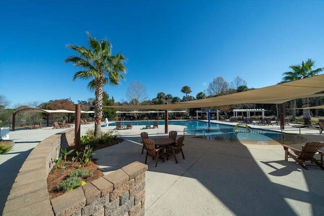community pool featuring a patio area