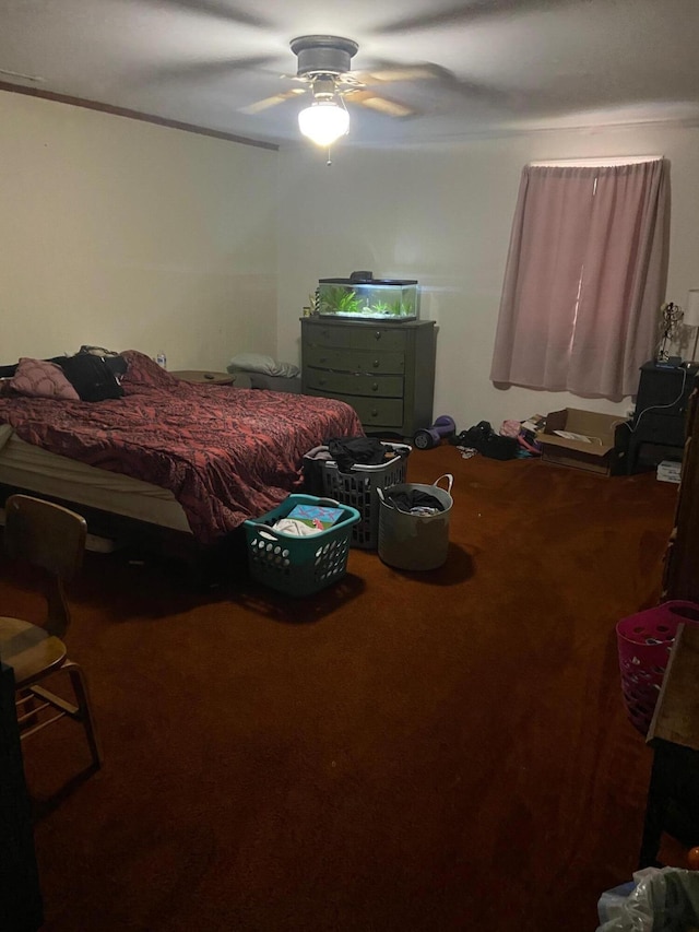 bedroom featuring ceiling fan and carpet floors