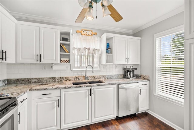 kitchen with appliances with stainless steel finishes, a sink, open shelves, ceiling fan, and backsplash