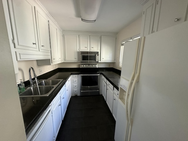 kitchen with white cabinetry, sink, and appliances with stainless steel finishes