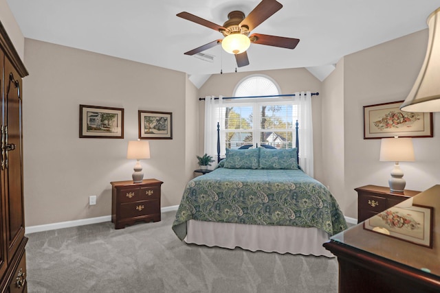 bedroom with light carpet, vaulted ceiling, and ceiling fan