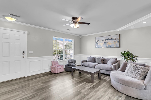 125 Towering Pine Dr, Ladson, SC 29456 - living area featuring a ceiling fan, crown molding, wainscoting, light wood-style flooring, and recessed lighting