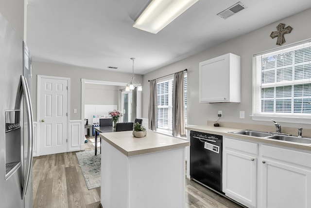 125 Towering Pine Dr, Ladson, SC 29456 - kitchen featuring dishwasher, stainless steel fridge with ice dispenser, a sink, light wood finished floors, and healthy amount of natural light