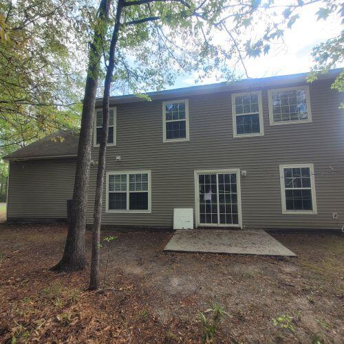 9471 Netted Charm Ct, Ladson, SC 29456 - back of house with a patio area